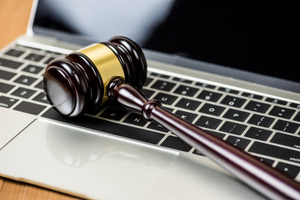 istock Close-Up Of Gavel On Laptop 1147724258
