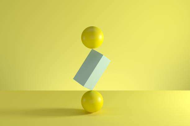 istock Stack of two yellow spheres and blue box in the middle isolated on yellow background. Minimal concept idea. 3D Render. 1147725632