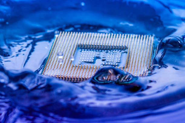 istock Close-Up Of Computer Chip In Water 1147725761