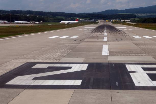 istock View Of Airport Runway Against Sky 1147725848