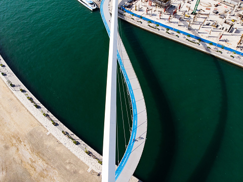 Dubai water canal tolerance bridge over the creek aerial view