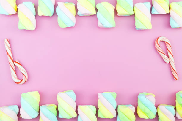 Close-Up Of Sweet Food Over Colored Background