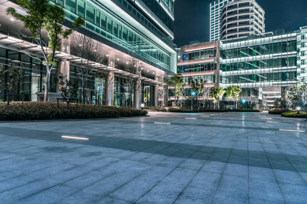 istock empty brick road nearby office building, china 1147733512