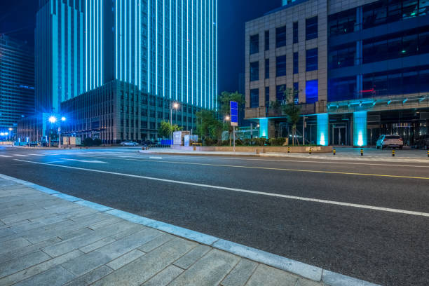 Empty Road And Modern Office Buildings Stock Photo - Download Image Now - Night, City, Street - iStock Empty Road And Modern Office Buildings Stock Photo - Download Image Now - Night, City, Street - iStock