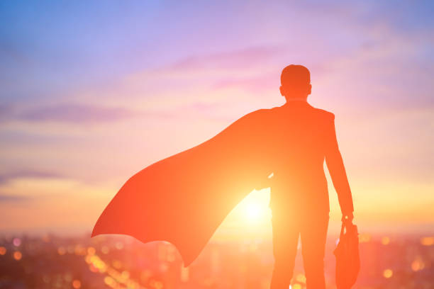 Businessman wearing a red cape. Success concept.