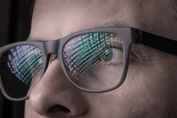 istock Eyes and glasses - man's face close up (macro) 1147737335