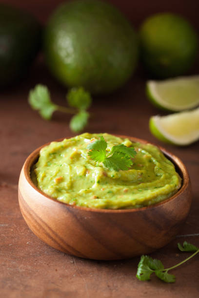 istock mexican guacamole dip and ingredients 1147742410