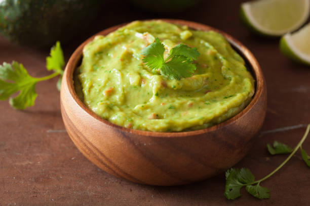 istock mexican guacamole dip and ingredients 1147742458