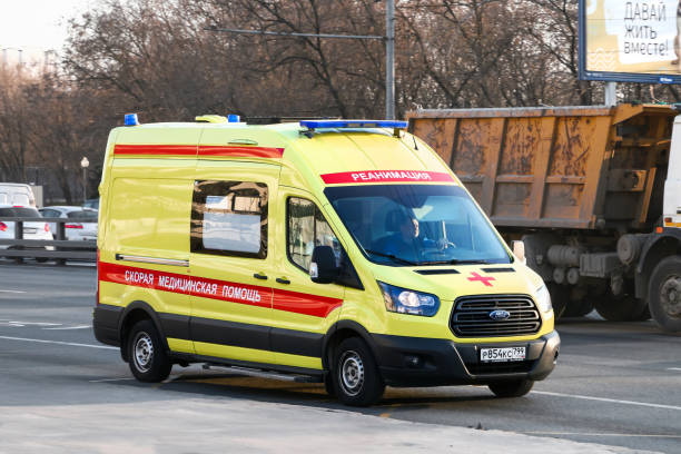 Ford Transit Moscow, Russia - April 19, 2019: Ambulance car Ford Transit in the city street. ford crossing stock pictures, royalty-free photos & images