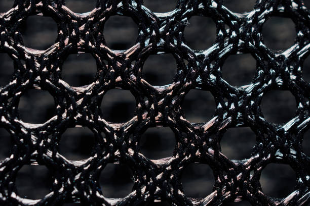 istock Hypnotic Pattern Background Of Black Fiber Mesh 1147745728