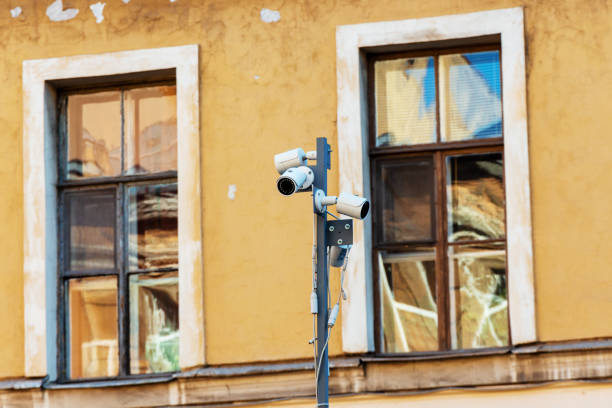 istock surveillance cameras on a city street 1147746788
