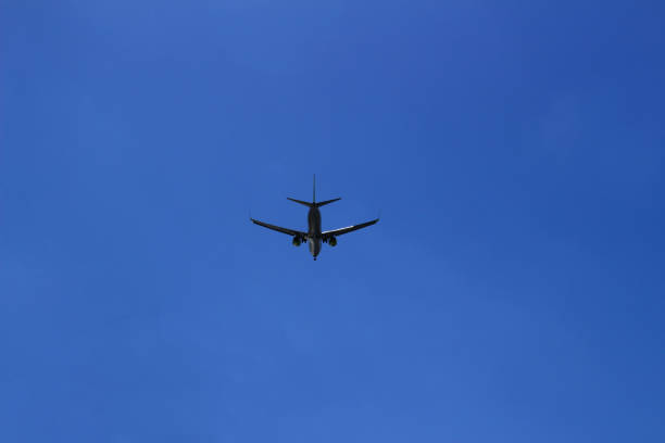 istock Jet airliner flying in the clear blue sky 1147746832