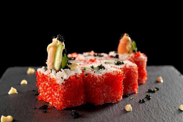 istock Volcano uramaki filled with cucumber, shimp. 1147749278