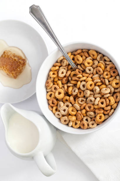 istock Breakfast serving of cereals with milk and honey 1147749645