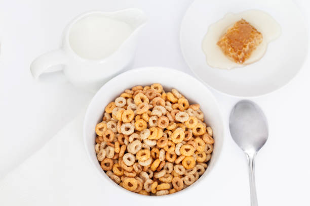 istock Breakfast serving of cereals with milk and honey 1147751092