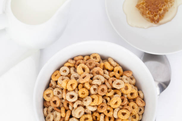 istock Breakfast serving of cereals with milk and honey 1147751112