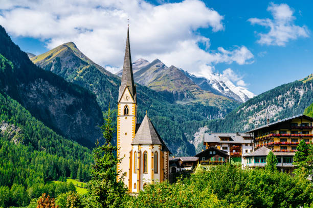 istock Vincent Church surrounded by Grossglockner mountains and pine forest. 1147752956