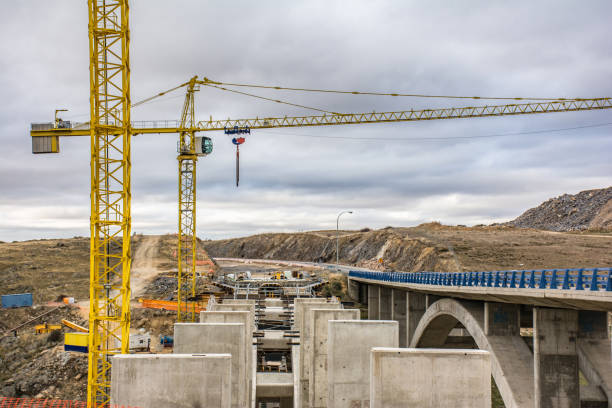 istock Construction of a bridge in Spain with cranes 1147753314