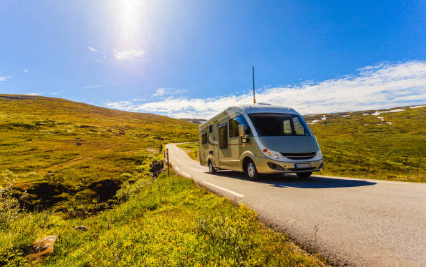 istock Camper car on road in orwegian mountains 1147754477