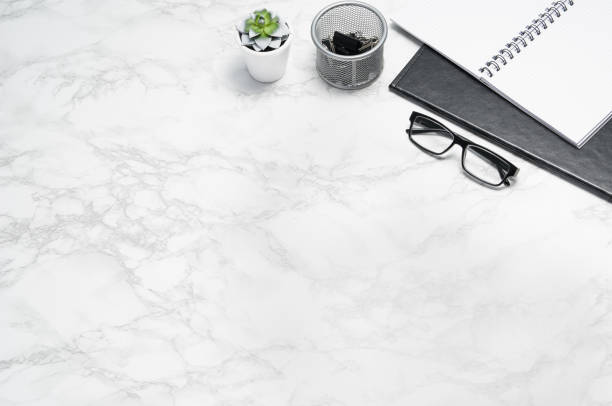 istock White office desk table with supplies copy space. Flat lay 1147760542