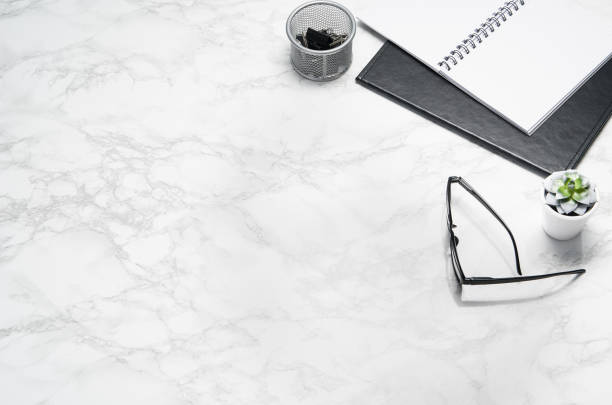 istock White office desk table with supplies copy space. Flat lay 1147760549