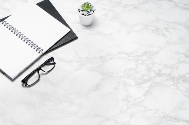 istock White office desk table with supplies copy space. Flat lay 1147760551