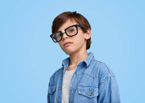 istock Little smart boy in broken glasses 1147768078