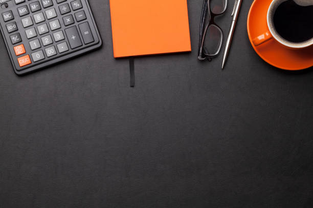 istock Office desk with coffee cup and supplies 1147769185