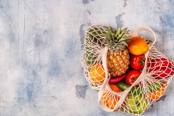 istock Fresh vegetables and fruits in bag mesh 1147769441