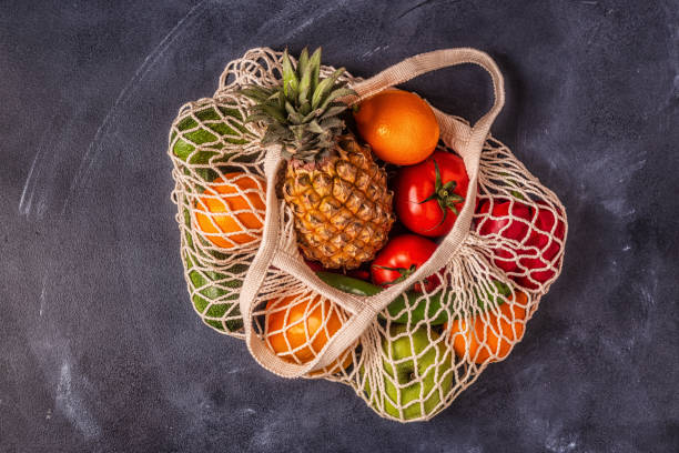 istock Fresh vegetables and fruits in bag mesh 1147769486