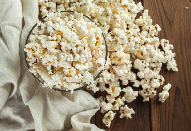 istock Salt popcorn on the wooden table 1147772005