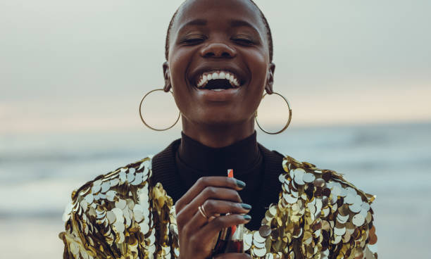 istock Woman having fun at beach 1147772375