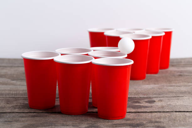 istock Game Beer Pong on wooden table 1147775648