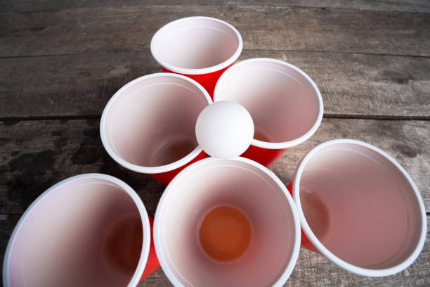 istock Game Beer Pong on wooden table 1147775805