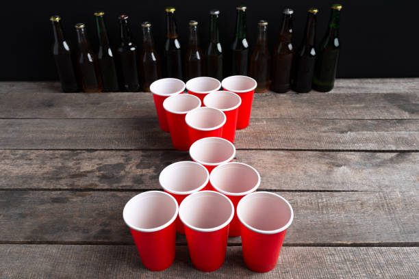istock Game Beer Pong on wooden table 1147775870