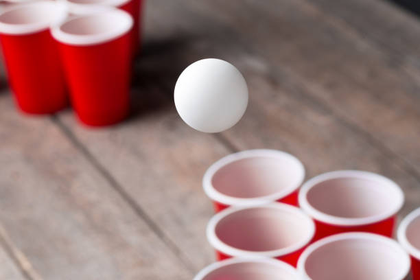 istock Game Beer Pong on wooden table 1147776051