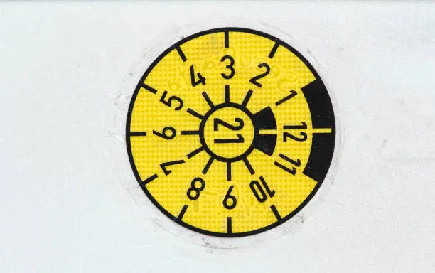 Yellow TÜV badge, white background, Germany