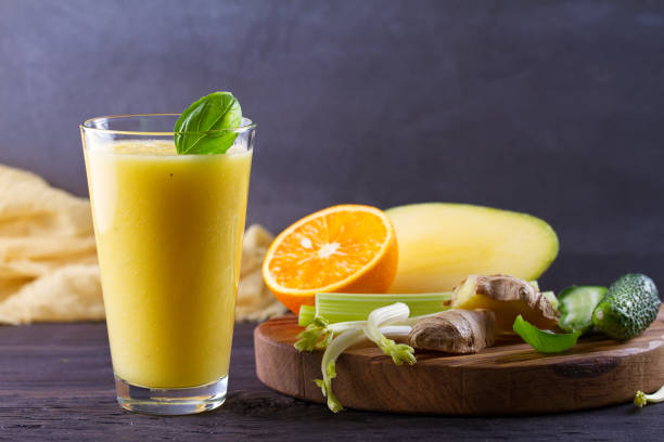 istock Orange Mango Ginger Smoothie. Fruit and Vegetable Smoothie - healthy diet and detox drink 1147776150
