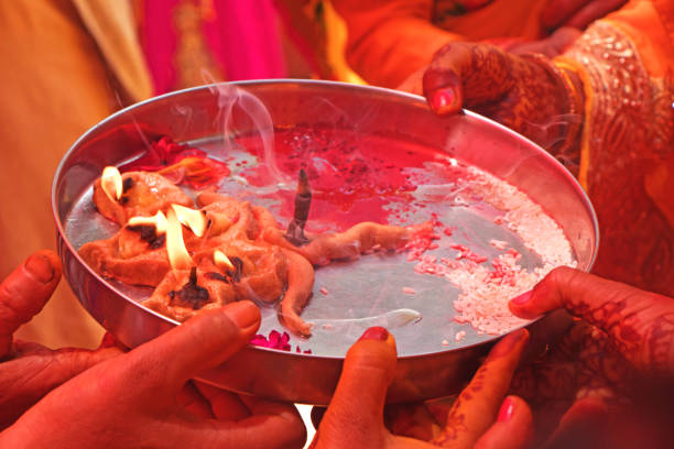 istock worshiping god with lights and joss stick-image 1147776376