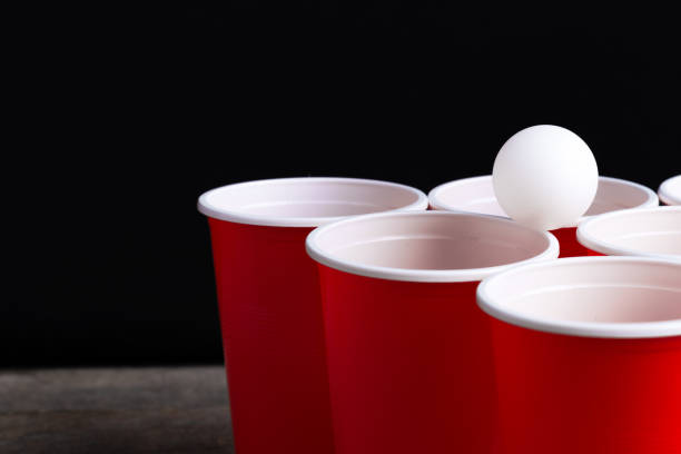 istock Game Beer Pong on wooden table 1147777015