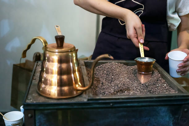 istock Cooking traditional turkish coffee in copper jezva pot, selective focus 1147777046