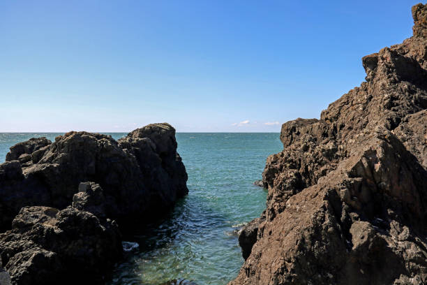 istock Rocks and Sea Inlet at a Coastal Location 1147777209