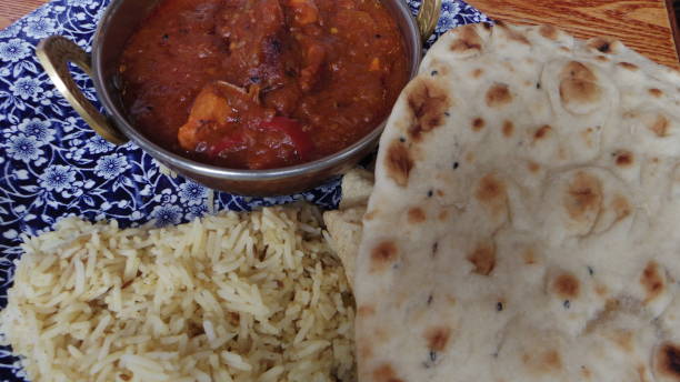istock Indian curry curry British nan and rice Pub 1147784731