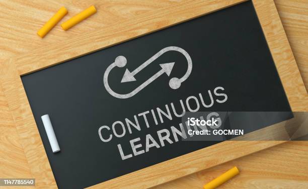 Continuous Learning On Blackboard Stock Photo - Download Image Now - Learning, Continuity, Education Training Class