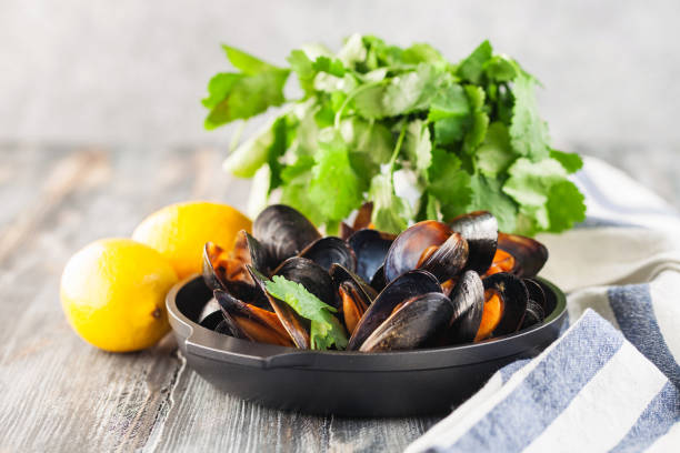 istock Mussels with herbs  and lemon 1147785555