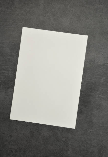 istock Blank white paper on desk 1147788358