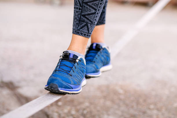 istock Slackline. Foots on the rope 1147788572
