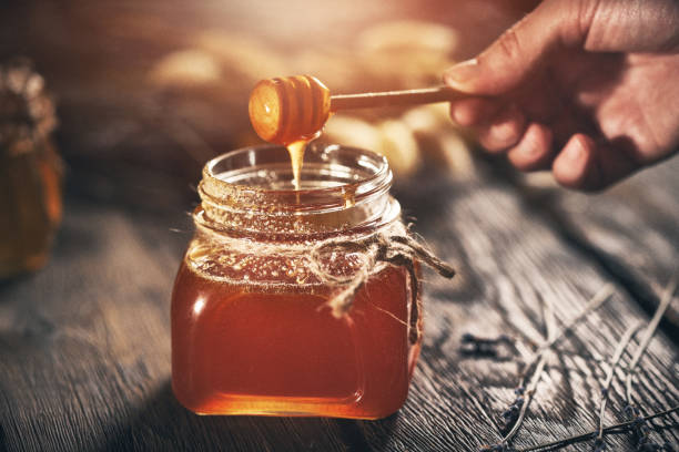 istock Honey products on wooden table 1147788783