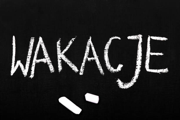 istock Colorful chalk drawing on a chalkboard: Polish word: summer holidays 1147790186