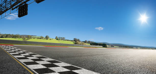 istock Wide angle view empty asphalt international race track 1147790299